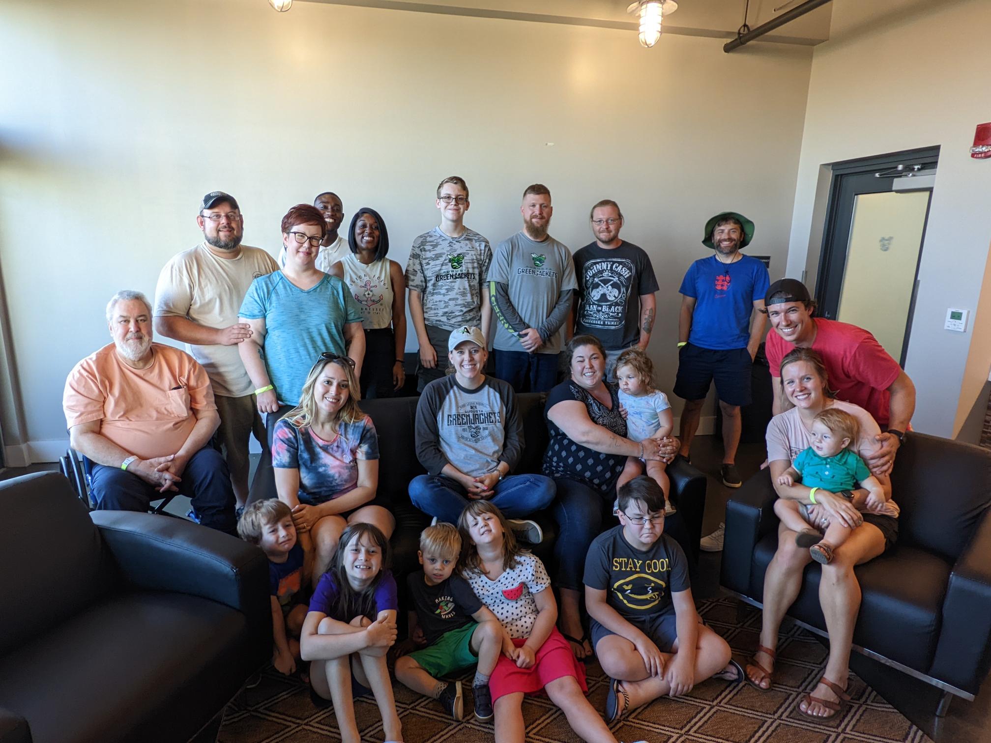 RPS team and their families at a green jackets baseball game in June 2021